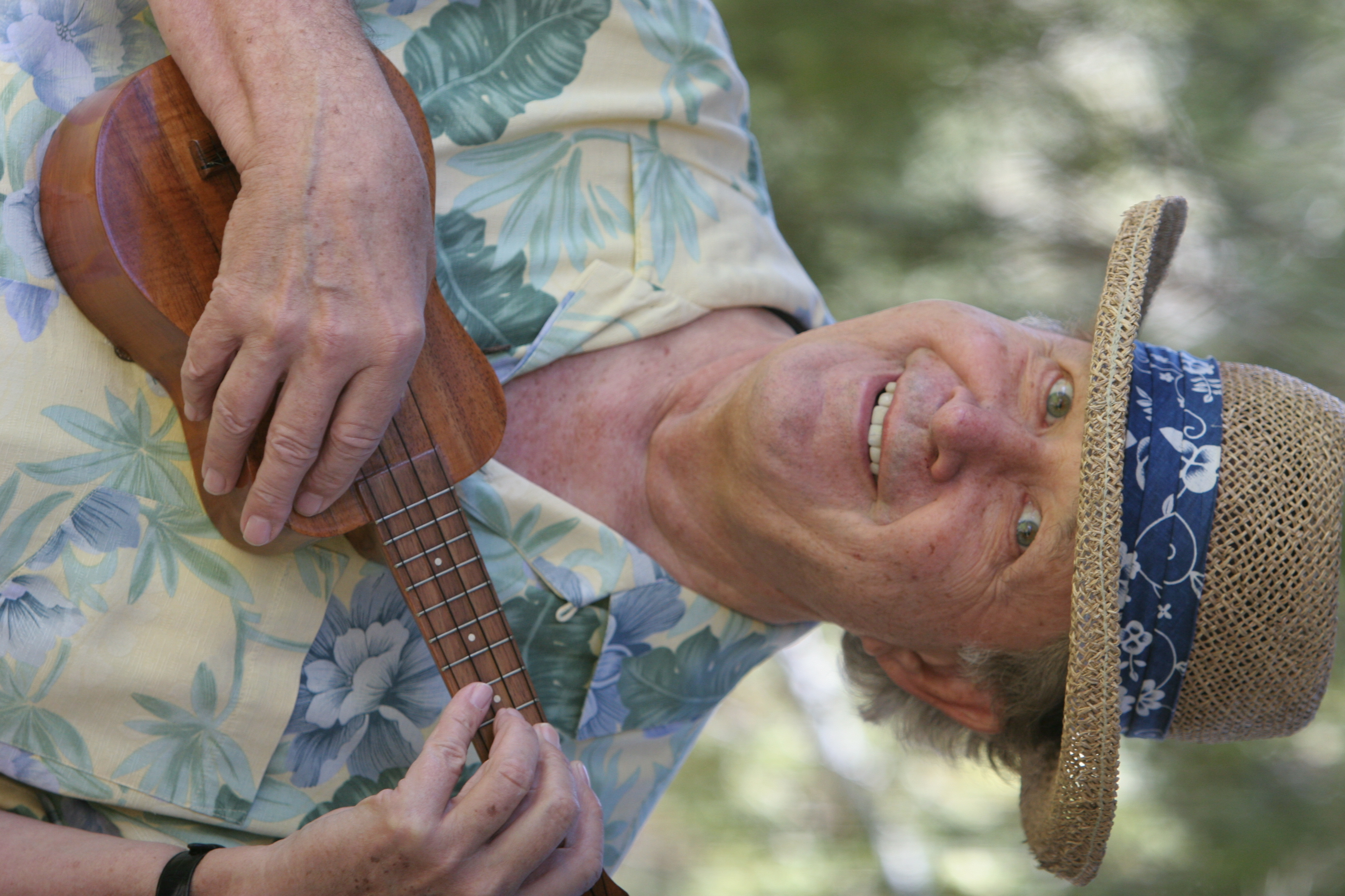 Dr. Loren Ekroth playing ukulele